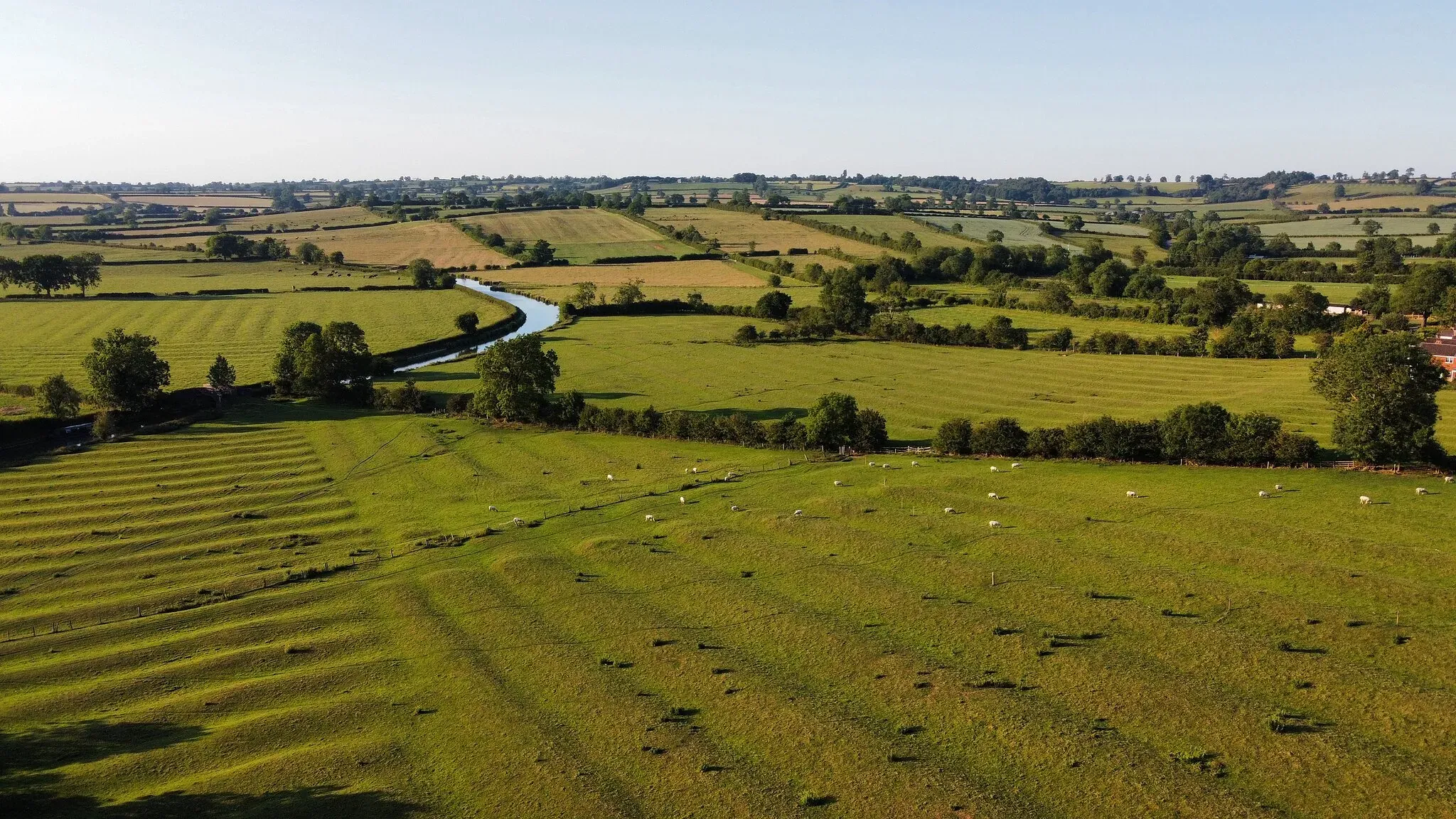 The Oxford Canal winding through the patchwork fields on the edge of Braunston